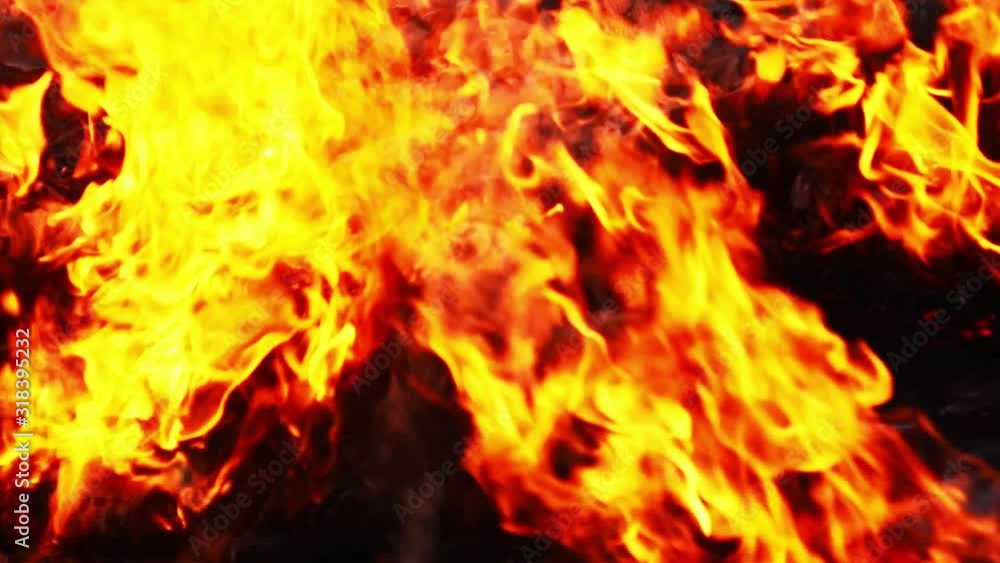 Slow motion fiery red flame burst into flames, pm 2.5 on dark background, which is a dangerous global warming. Slow motion fiery red flame burst into flames, pm 2.5 on dark background, which is a dangerous global warming.