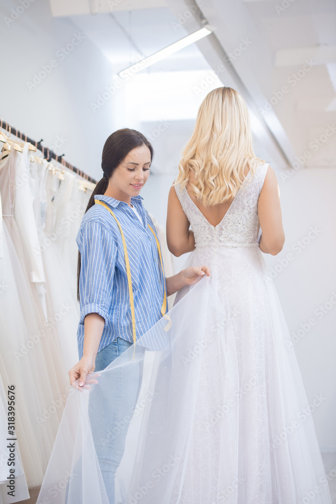 Adjusting hem of wedding dress Adjusting hem of wedding dress