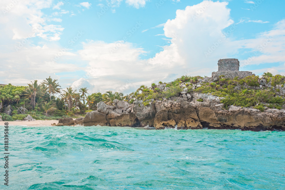 Tulum Archaeological Site seen from the Caribbean Ocean. Ancient Mayan pyramids located in Riviera Maya, Mexico