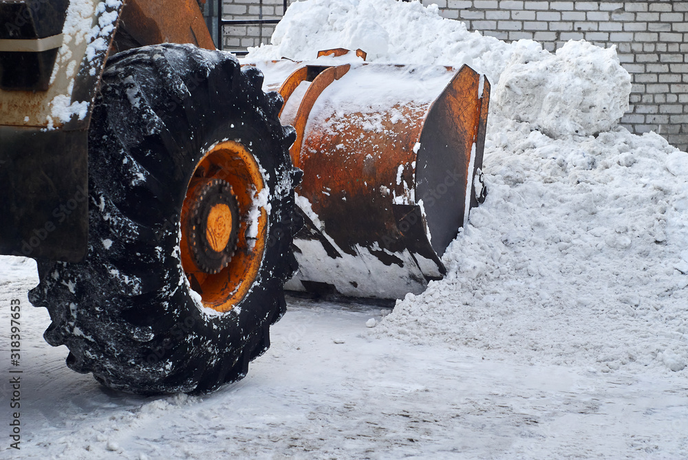 loader bucket removing snowdrift close up loader bucket removing snowdrift close up