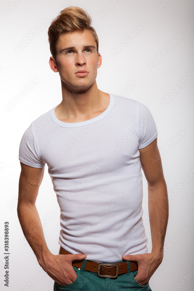Handsome young elegant man studio portrait. Handsome young elegant man studio portrait.