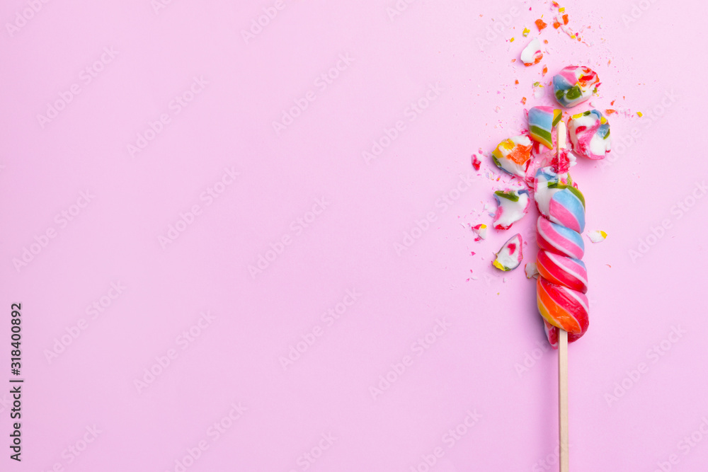 Crushed lollipop on color background - obrazy, fototapety, plakaty 