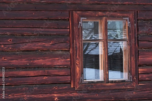 Wooden window on historical blockhouse from 19th century in northern Slovakia