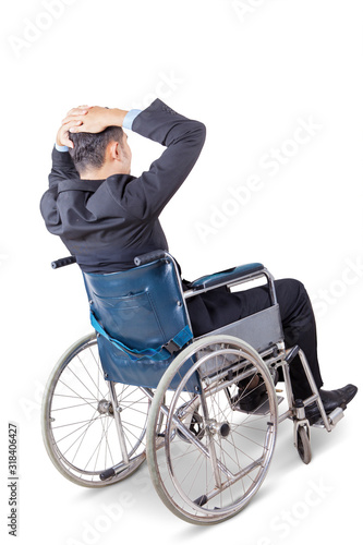 Back view of stressful businessman on wheelchair © Creativa Images