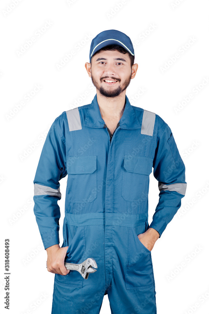 Mechanic in blue uniform smiling at the camera Mechanic in blue uniform smiling at the camera