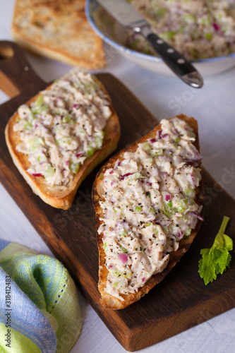 Tuna salad sandwiches on serving board. Healthy nutrition food