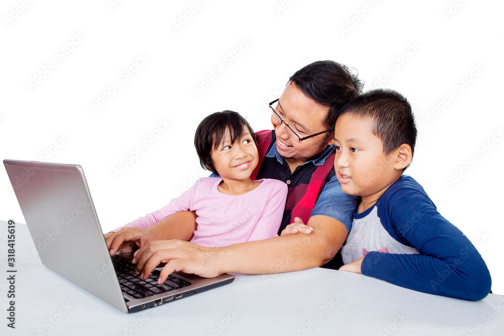 Portrait of father looking at his daughter proudly Portrait of father looking at his daughter proudly