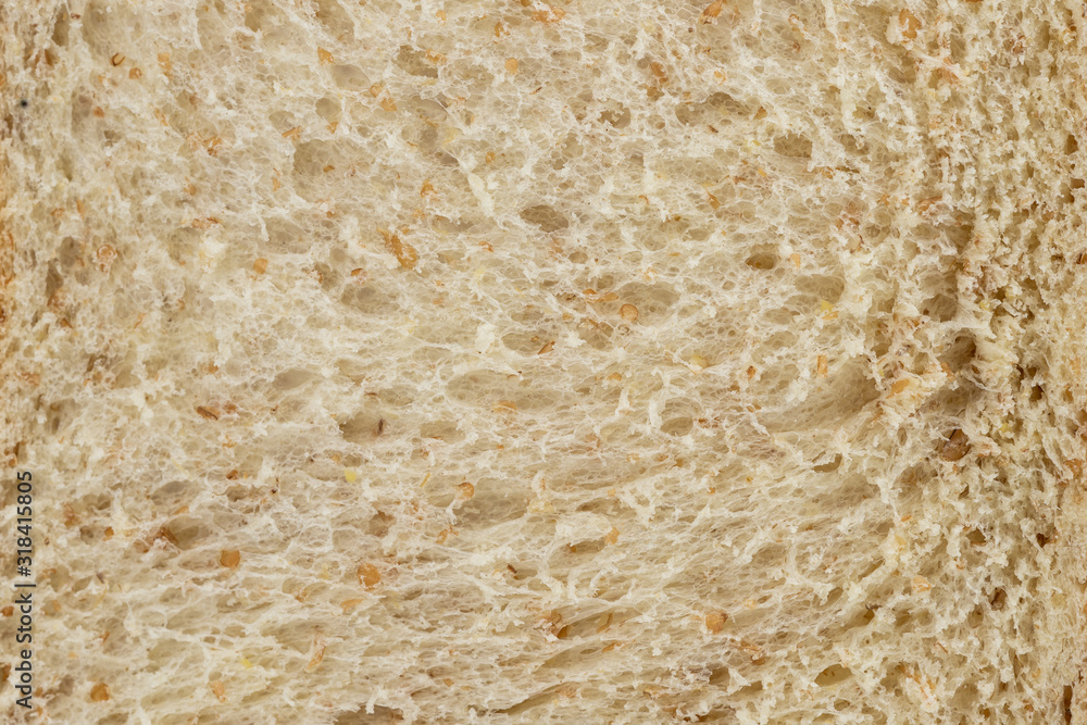 Close-up of healthy whole wheat bread for background texture.