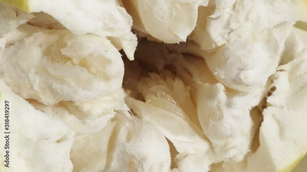 partly peeled fruit pomelo close-up macro partly peeled fruit pomelo close-up macro