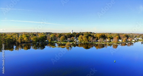 The aerial view of the waterfront homes by Oneida Lake with stunning fall foliage at Syracuse  New York  U.S.A