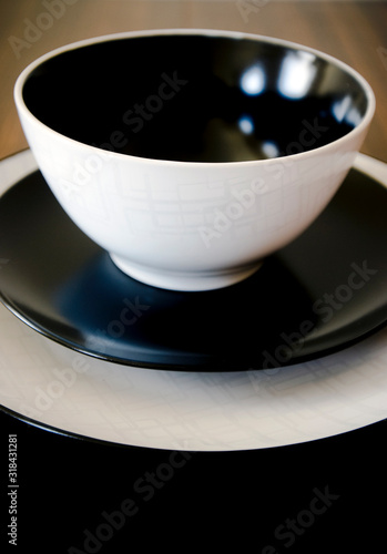 Fototapeta Naklejka Na Ścianę i Meble -  Place setting with large plate, small plate, bowl