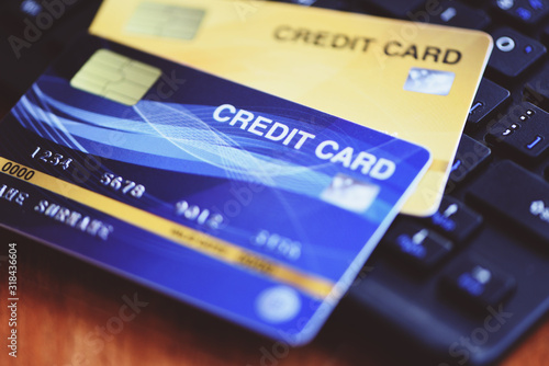 Online payment credit card on keyboard - shopping online technology and credit card payment concept