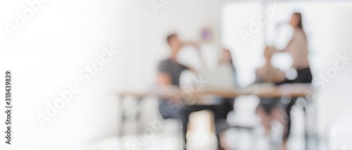 Abstract blurred interior modern office space with business people working banner background with copy space. photo