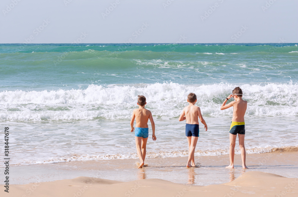 Children on the background of the sea Children on the background of the sea