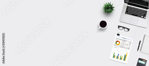 Top view office desk and supplies, with copy space. Creative flat lay photo of workspace desk/Panoramic banner background