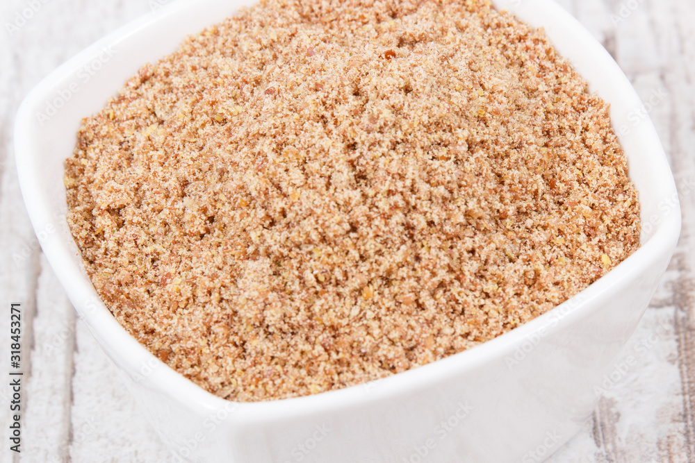 Linseed in glass bowl as healthy food containing vitamins, fiber and acids omega Linseed in glass bowl as healthy food containing vitamins, fiber and acids omega