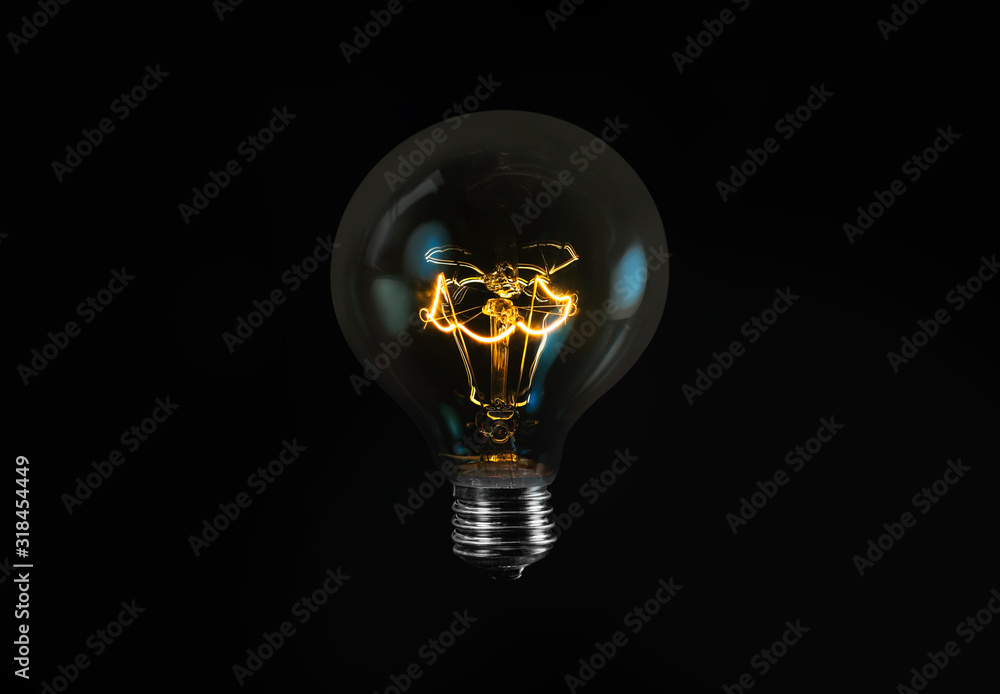 Tungsten light bulb isolated on black background Tungsten light bulb isolated on black background