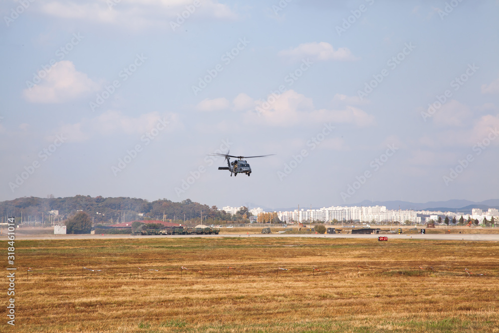 Fototapeta premium dynamic airshow by Helicopter