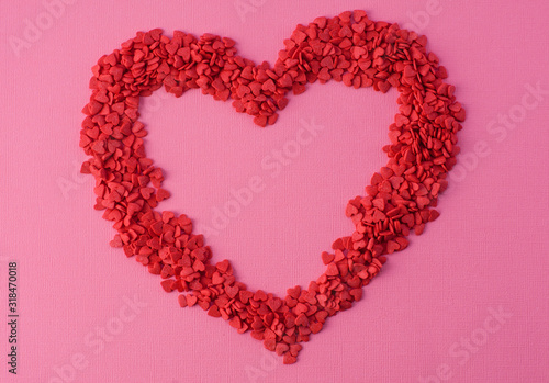 heart made of coffee beans isolated on white