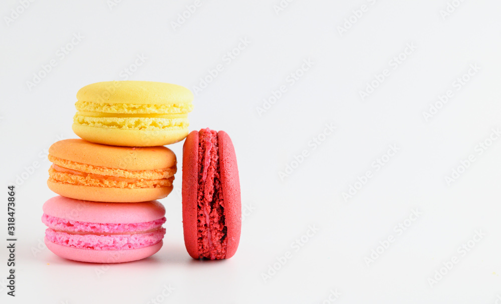 colourful macaroons on a White marble background,Food concept background. colourful macaroons on a White marble background,Food concept background.