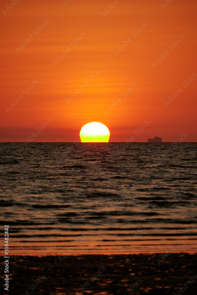 A sunset view with Omega sun at Hat Yao, Krabi, Thailand A sunset view with Omega sun at Hat Yao, Krabi, Thailand