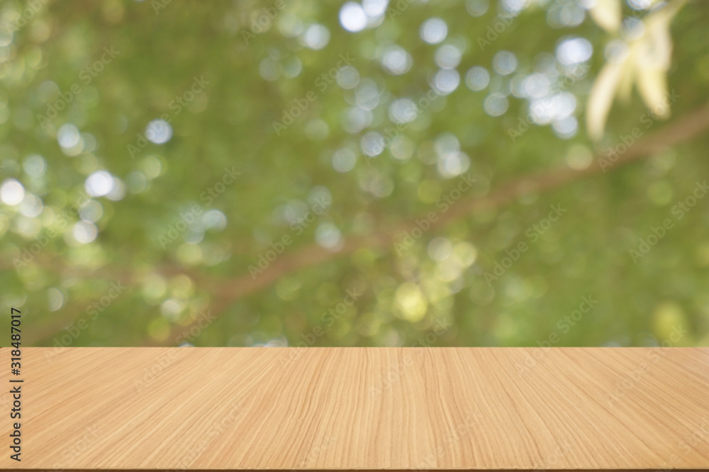 Empty dark wooden table in front of abstract blurred bokeh background of restaurant . can be used for display or montage your products.Mock up for space. Empty dark wooden table in front of abstract blurred bokeh background of restaurant . can be used for display or montage your products.Mock up for space.