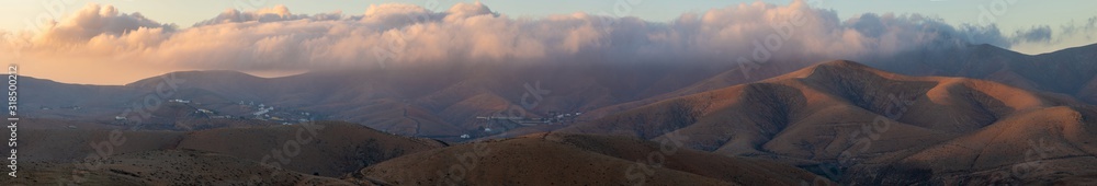 panorama of mountain and volcanic formations in the central part of Fuerteventura at sunrise