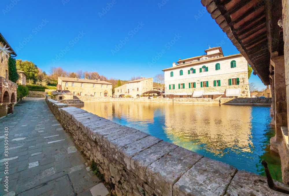 Bagno Vignoni (Italy) - A view of the famous thermal waters village in Val d'Orcia, Tuscany region province of Siena, beside Via Francigena religious street Bagno Vignoni (Italy) - A view of the famous thermal waters village in Val d'Orcia, Tuscany region province of Siena, beside Via Francigena religious street