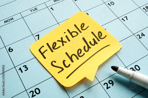 Flexible schedule handwritten memo on the calendar. photo