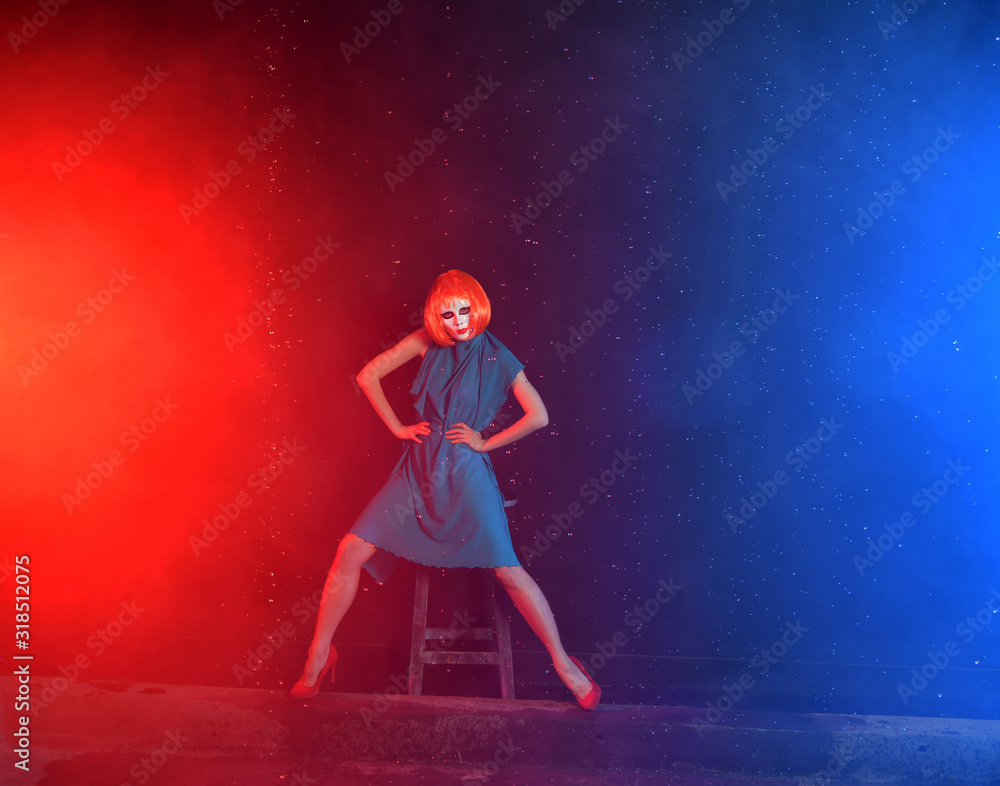 mystical girl with red hair in a white mask on a blue background with smoke mystical girl with red hair in a white mask on a blue background with smoke
