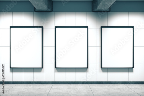 Subway station with empty three banners