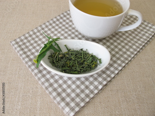 A cup of tea with dried hedge mustard