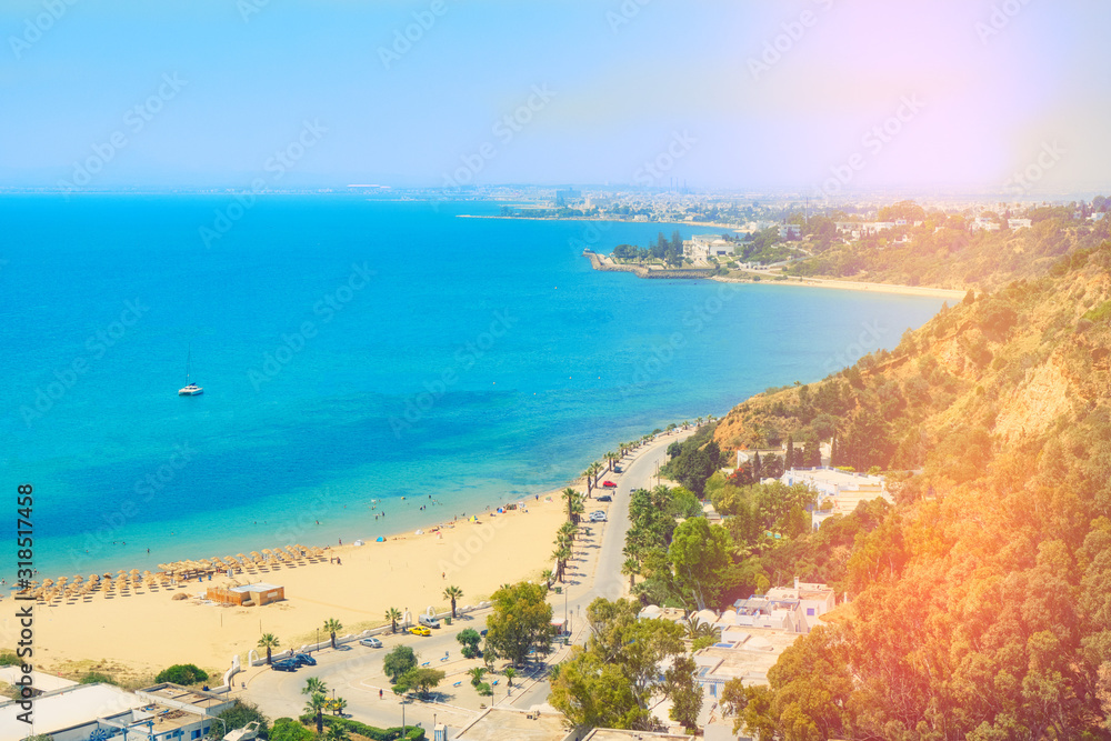 Sea Bay, beach, promenade and coastal road in Sidi Bou said, top view. Mediterranean, Tunisia. June, 2019