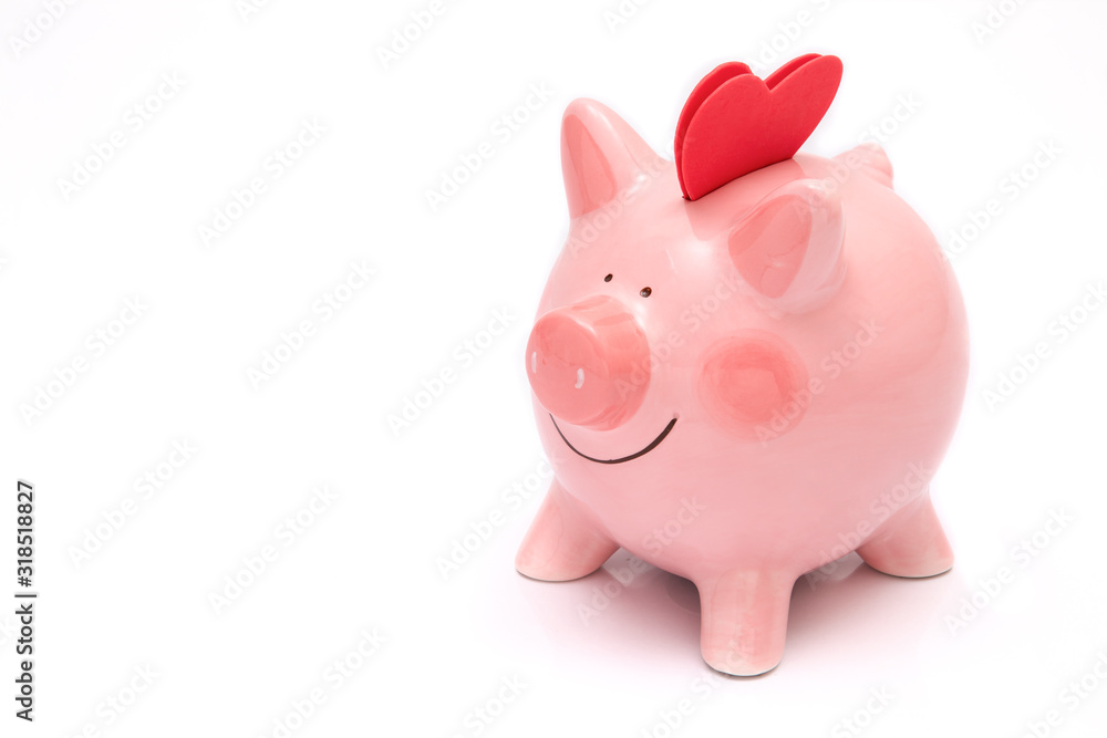 Two red heartas on a piggy bank Two red heartas on a piggy bank