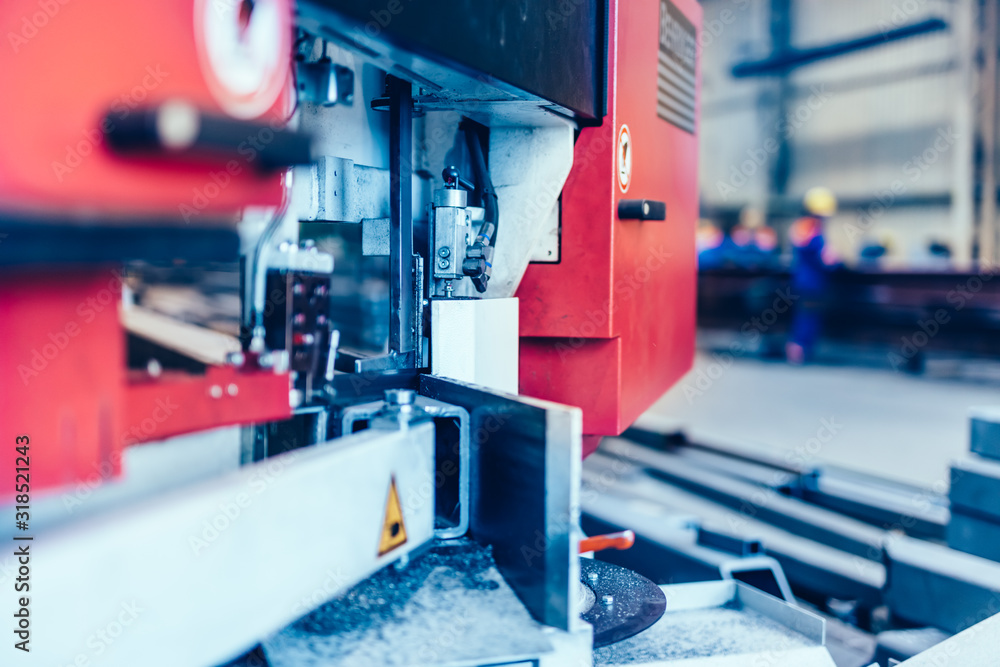 Saw machine for cutting steel profiles in a factory, Saw machine for cutting steel profiles in a factory,