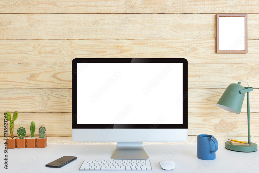 Computer with blank white copy space for text and wood background, Mockup design desktop computer in office on white table with keyboard and Coffee cub, Work place concept, Cactus in pot. Computer with blank white copy space for text and wood background, Mockup design desktop computer in office on white table with keyboard and Coffee cub, Work place concept, Cactus in pot.