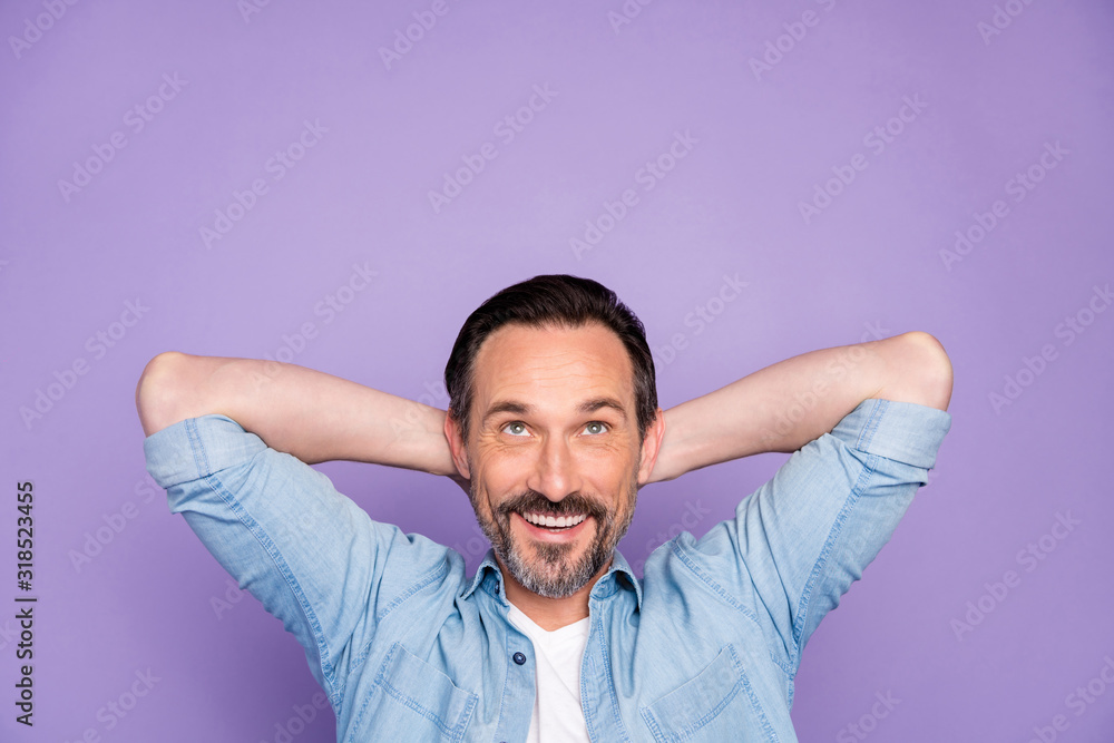 Top above high angle photo of positive cheerful man lie have rest relax look copyspace feel imagination, inspiration wear modern clothing isolated over violet color background Top above high angle photo of positive cheerful man lie have rest relax look copyspace feel imagination, inspiration wear modern clothing isolated over violet color background