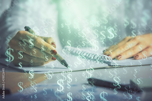 Double exposure of woman's hands making notes with forex graph hologram. Concept stock market analysis.