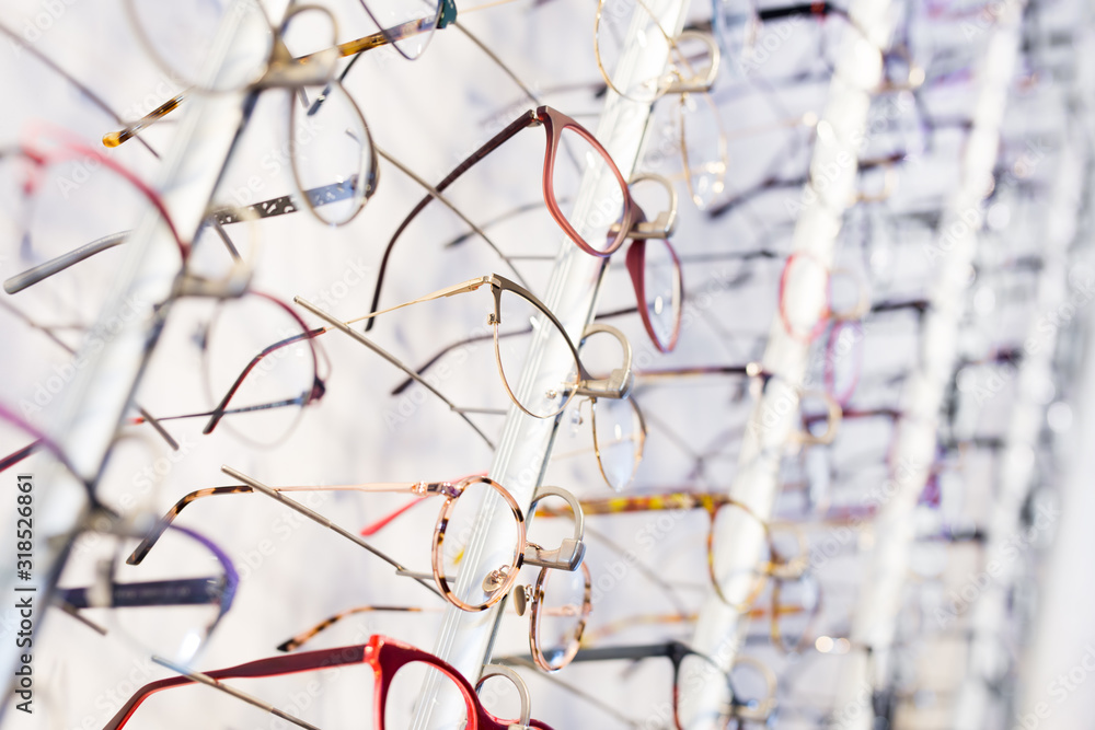 Glasses showcase in modern optic shop
