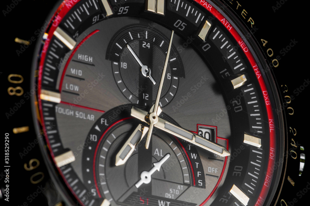 Luxury sport chronograph black Analog Men's Watch silver red steel for men luxury on black background - detail view Luxury sport chronograph black Analog Men's Watch silver red steel for men luxury on black background - detail view