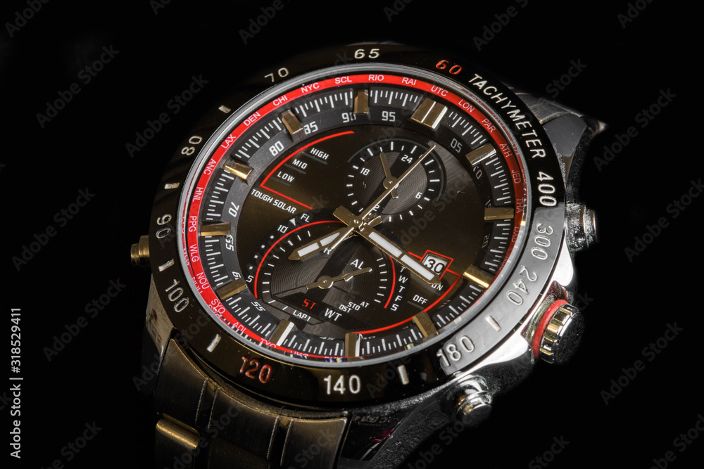 Luxury  sport chronograph black Analog Men's Watch silver red steel for men luxury on black background - detail view