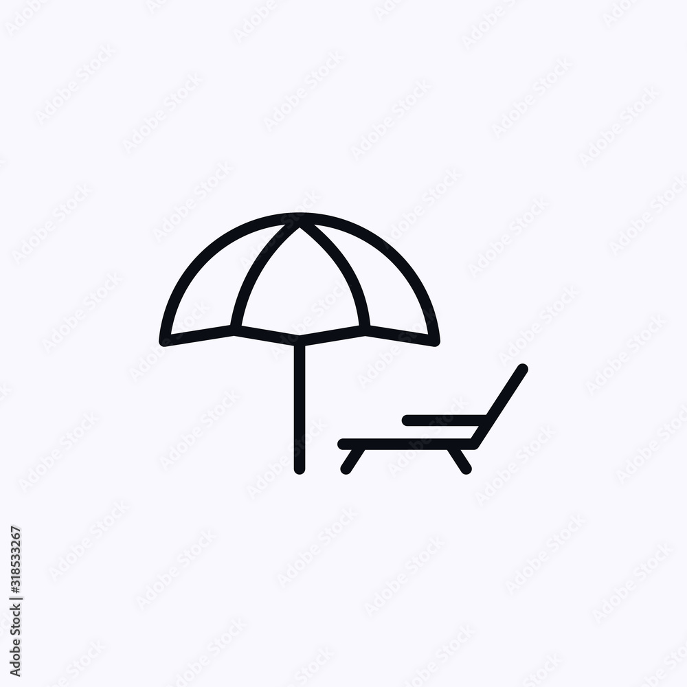 Chaise lounge under an umbrella Chaise lounge under an umbrella