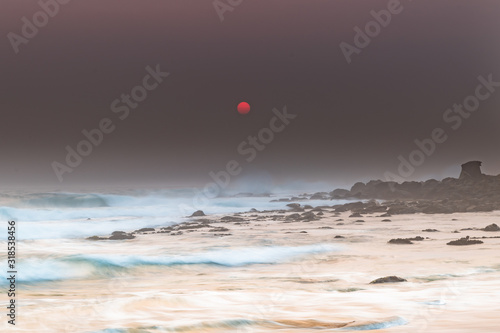 Red Sun Smoke Haze Seascape