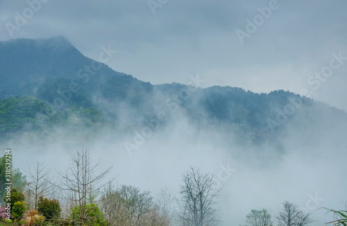 The mountain scenery in the mist in spring