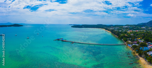 Fototapeta Naklejka Na Ścianę i Meble -  Aerial view drone shot of long tail boat at rawai beach,phuket Thailand.