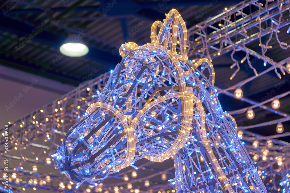 Illumination of Santa Claus in a cart on deer for Christmas