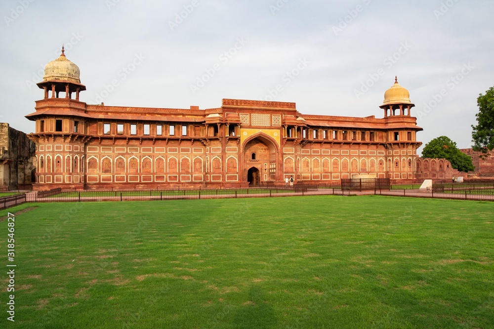 Famous Agra Fort known also as Red Fort in India at sunset visited by tourists