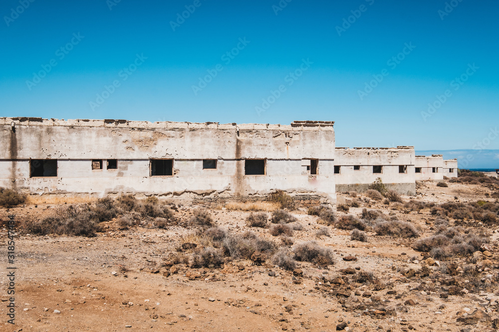 abandoned building ruins in ghost town in desert landscape abandoned building ruins in ghost town in desert landscape