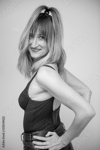 Pretty woman posing with black lingerie