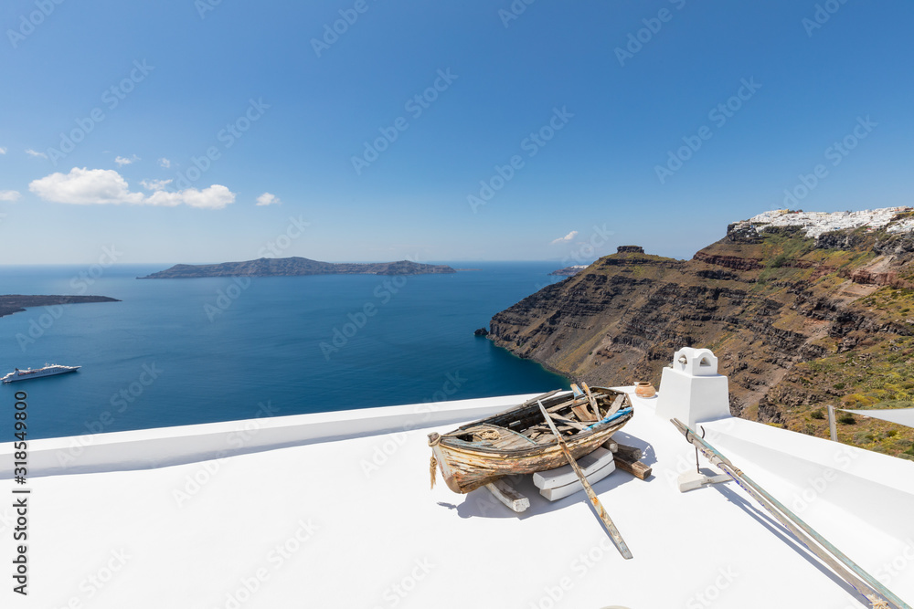 Fototapeta premium Santorini, Greece. Famous view of traditional white architecture Santorini landscape with blue sky. Summer vacations background. Luxury travel tourism concept. Amazing summer destination
